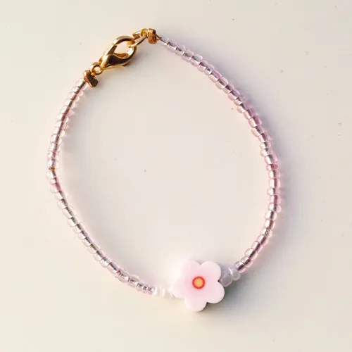 Armbandje voor de allerkleinsten - roze met bloem