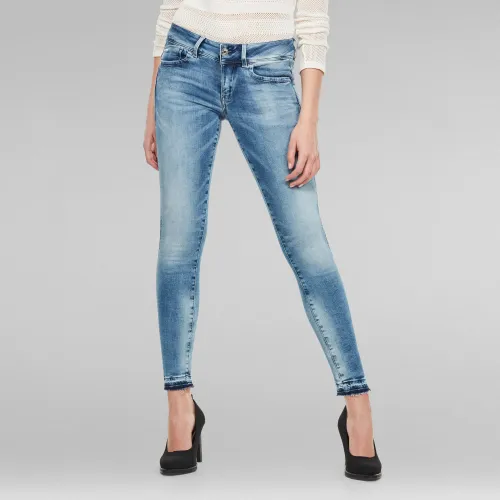 Lynn Mid Skinny Ripped Edge Ankle Jeans