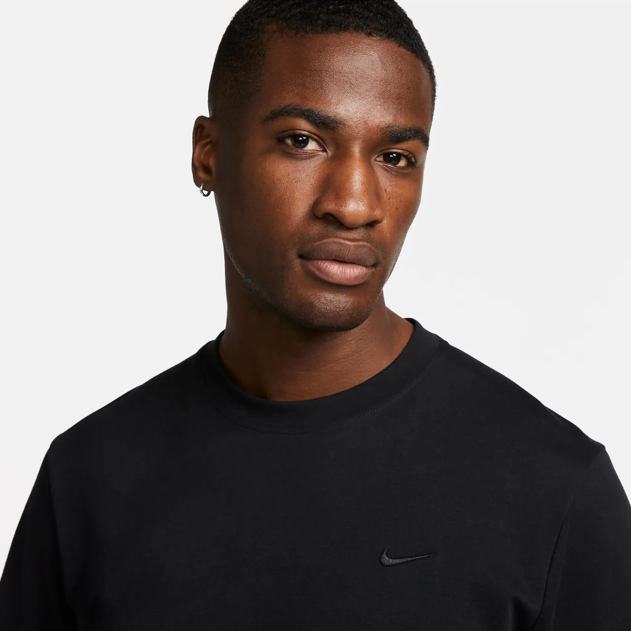Nike Primary Dri-FIT multifunctionele herentop met korte mouwen - Zwart