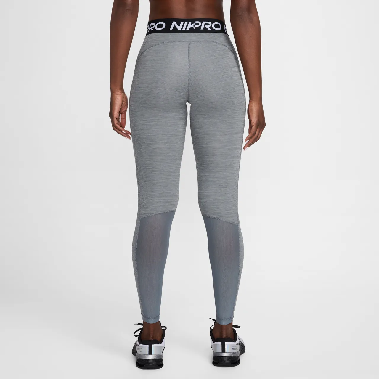Nike Pro Legging met halfhoge taille en mesh vlakken voor dames - Grijs