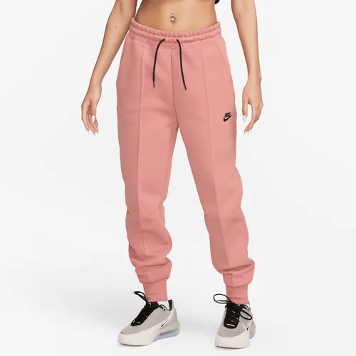 Nike Sportswear Tech Fleece Joggingbroek met halfhoge taille voor dames - Roze