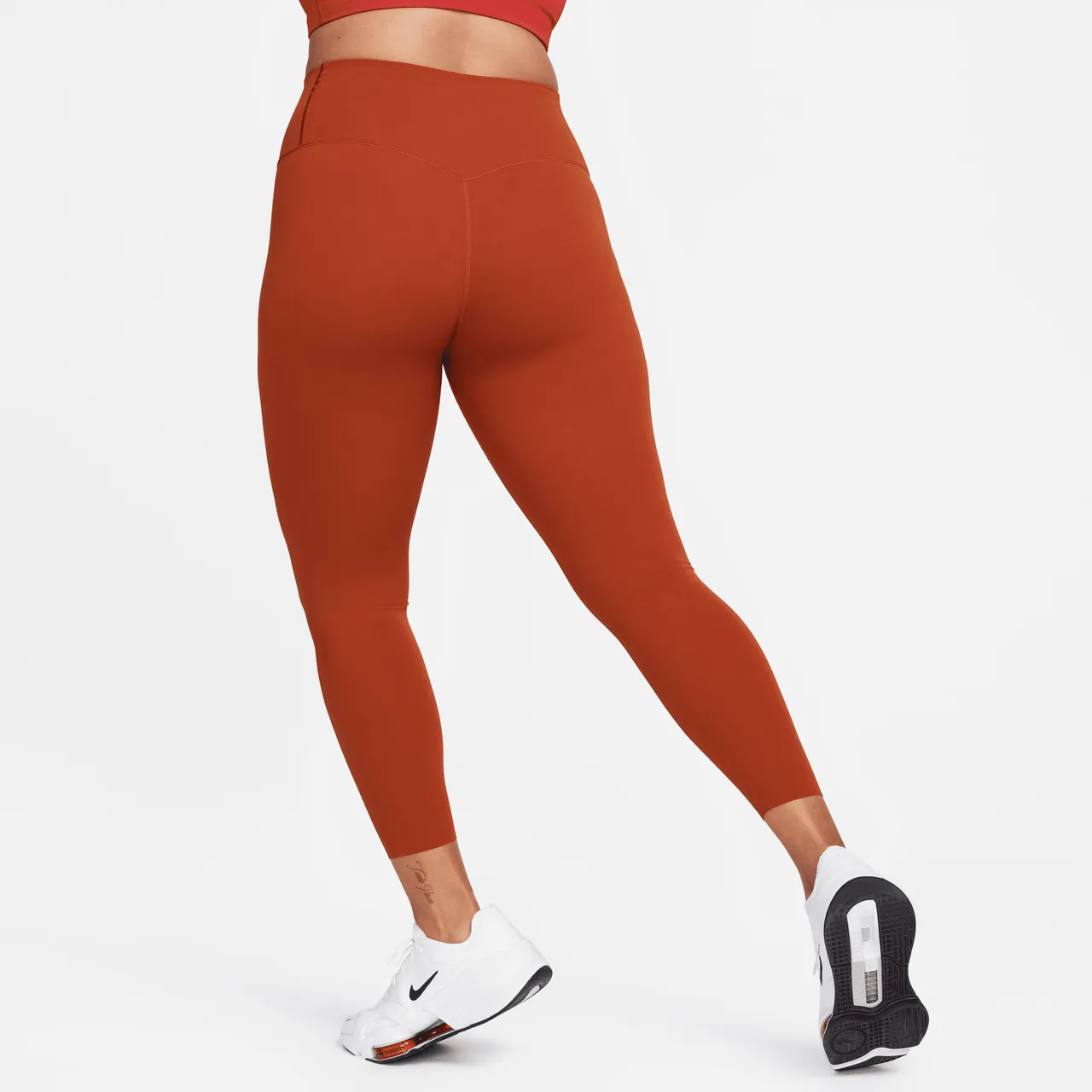 Nike Zenvy 7/8-legging met iets ondersteunende hoge taille voor dames - Oranje