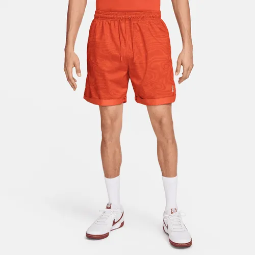 NikeCourt Heritage Dri-FIT tennisshorts voor heren (15 cm) - Oranje