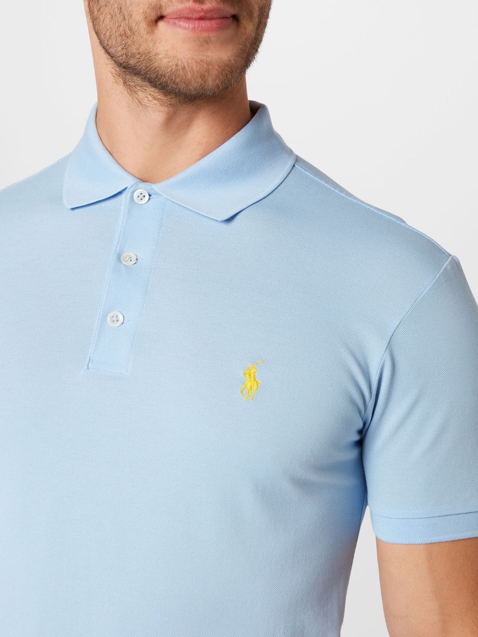 Polo  Shirt  lichtblauw / geel