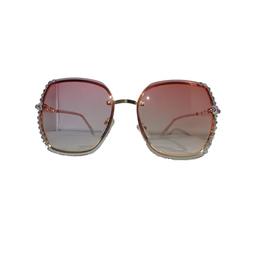 Zonnebril - roze glazen met stras steentjes en goudkleurig montuur met brilkoker